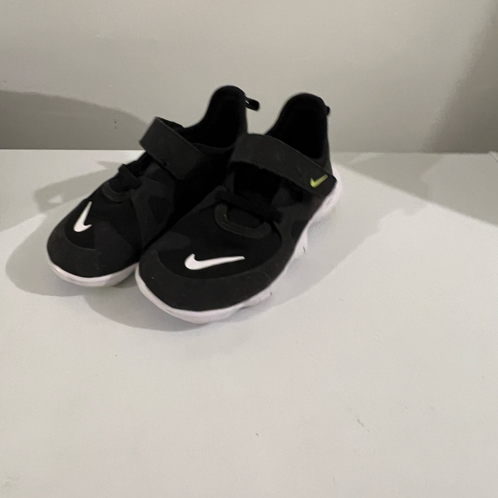 Brand new Nike Kids Black and White Shoes size 11m